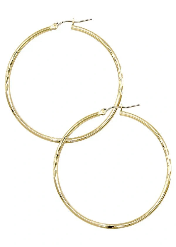 Effortlessly Chic: The Magic of Gold Hoops for Every Woman